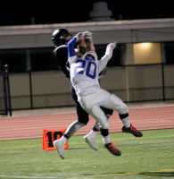 Can you believe that Tigers Ferdinando Spista (black uniform) came down with the football? Well he did over Port Chester defensive back Merlin Gonzales (#20) for a 60-yard reception in the fourth quarter. The reception set up a one-yard touchdown run by Markland Edwards but it was too little too late as Port Chester won Goddard Bowl, 28-14, at WPHS, on Friday. Albert Coqueran Photos