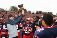 Father Tom Collins, the President of Stepinac High School was a staunch advocate for the return of the traditional City of White Plains Turkey Bowl Game. Collins presented the 2016 Turkey Bowl Trophy to the Stepinac players after they defeated local rival White Plains High School, 49-32, in the 43rd meeting between the two teams. Albert Coqueran Photo