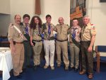 Left to right: Scoutmaster Emeritus Nick Stolatis, Eagle Scout inductees Jon Paul Watts, Gregory Hunter and John Geier, Scoutmaster Ira Promisel, Eagle Scout Joseph Trudo, and Assistant Scout Master Ed Elliott at last Sunday afternoon’s ceremony in Pleasantville.