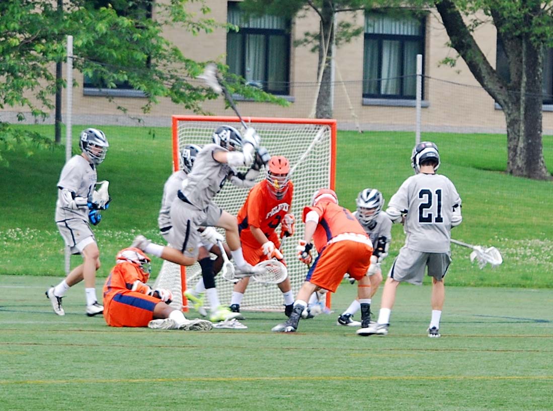 Hackley middie Leo Barse sets up a shot against Fieldston Wednesday in the NYSAIS Boys Lacrosse Championship at Manhattanville College. The Hornets won 15-5 to claim the state title.