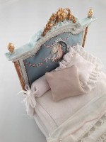 BOW-2 | The Examiner News Bed with hand-painted upholstery.