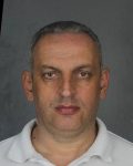 566 MK Green Card Scam pic | The Examiner News