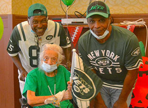 Angelina Friedman was joined last week for her 103rd birthday at North Westchester Restorative Therapy & Nursing Center in Mohegan Lake by former New York Jets Wesley Walker and Freeman McNeill. Abby Luby photo
