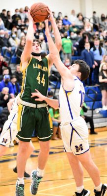 Lakeland-F-Logan-Shiland-is-defended-by-Mahopac's-Joey-Koch-in-Hornets'-63-50-Class-A-playoff-win-over-Hornets-Tuesday | The Examiner News