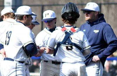Walter-Panas-pitching-coach-Mikey-Anderson-with-team | The Examiner News