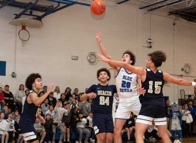 Blue-Devils-senior-scoops-shot-for-1000th-point | The Examiner News