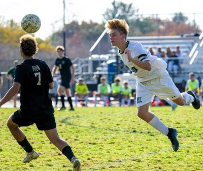 Pleasantville-senior-M-Kai-Martens-Wallace-heads-ball | The Examiner News Kai Martens Wallace