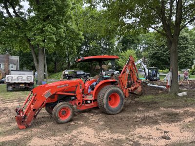 Vehical-operated-by-Town-of-Pleasantville-employees-to-excavate-the-site | The Examiner News