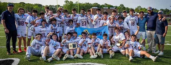 Greeley players pose with the hardware for the first time in Quaker history | The Examiner News Greeley boys lax