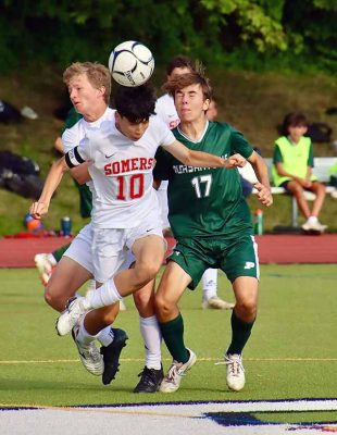 Somers captain Randy Contreras and Pleasantvilles Nick Tassier challenge for head ball | The Examiner News Somers captain Randy Contreras