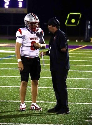 Somers coach Anthony DeMatteo and QB Tristan Iglesias gather | The Examiner News Somers coach Anthony DeMatteo