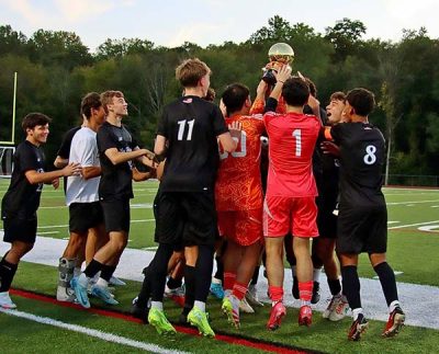 Yorktown soccer team celebrate their title victory Husker tournament | The Examiner News Yorktown soccer team
